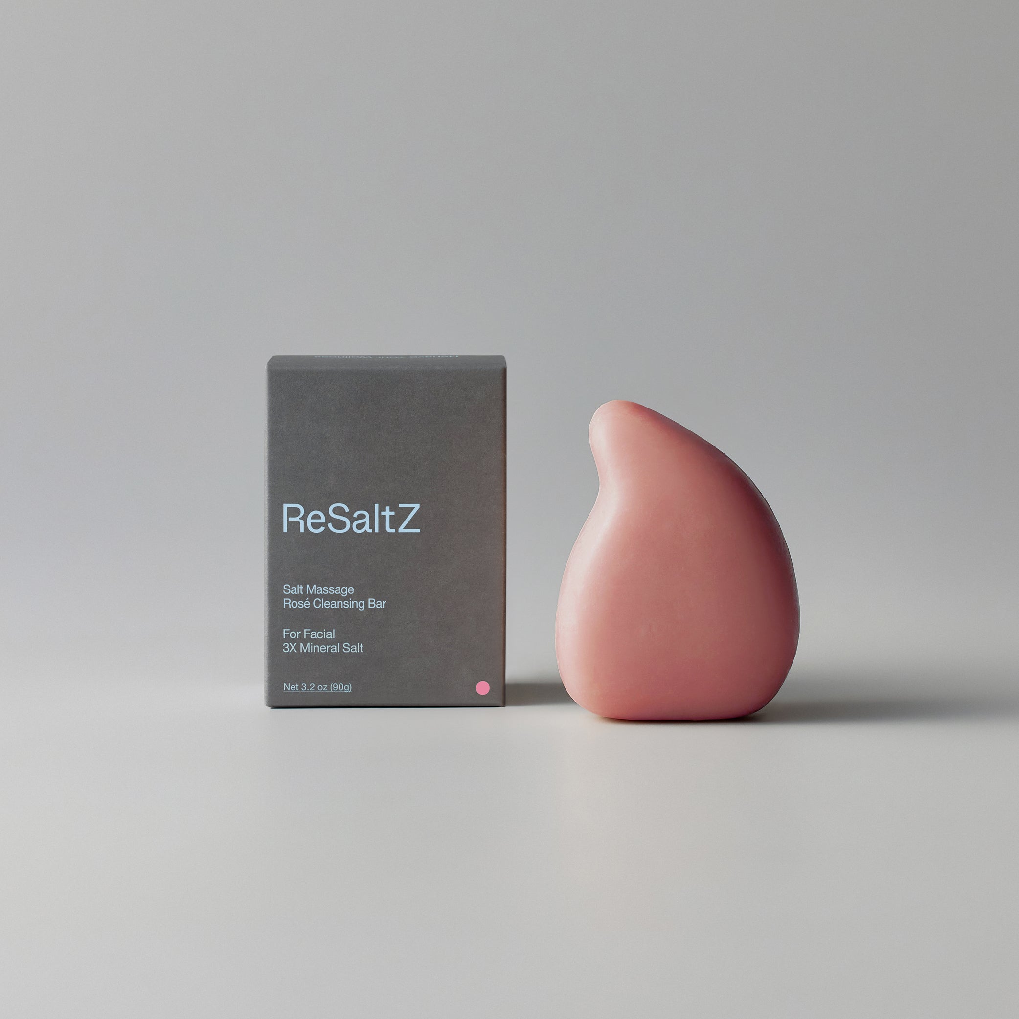 ReSaltZ Salt Massage Cleansing Bar Rosé alongside the packaging box.